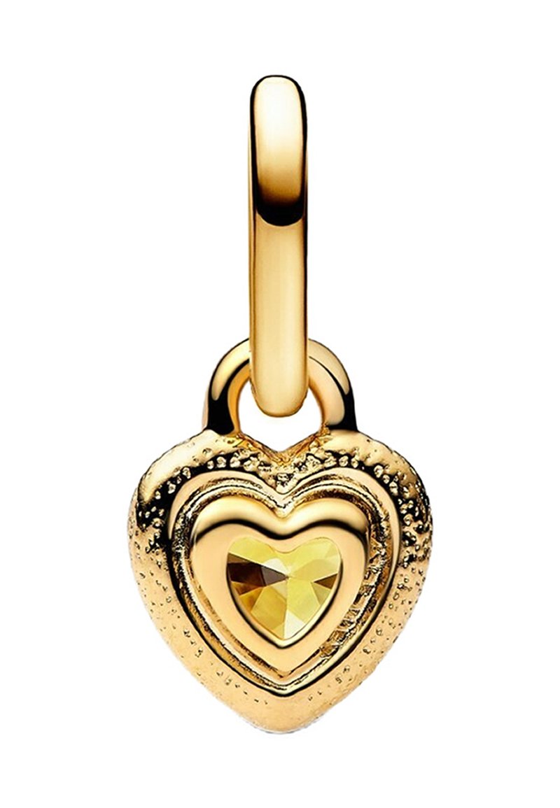 Pendentif en or en forme de cœur avec une pierre précieuse jaune au centre. Surfaces lisses et texturées avec un design en couches en forme de cœur.
