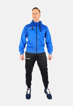 Blue zip-up hoodie with black pants; features a comfortable fit, elastic cuffs, and white branding on the chest and pant leg.