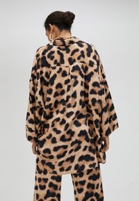 LOLA CASADEMUNT Paitapusero - leopard