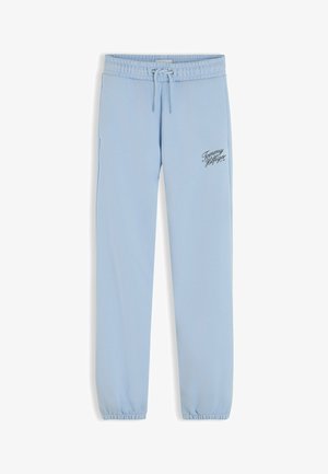 Lyseblå joggingbukser med elastisk talje og manchetter, snor og lille sort kursivt logo på venstre lår.