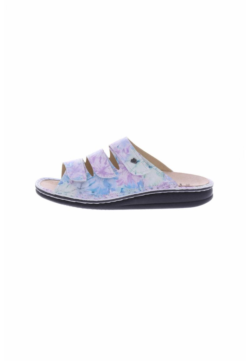 Slip-on sandal with three fabric straps, featuring a pastel watercolor pattern, a smooth leather footbed, and a black rubber sole.