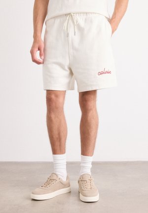 PREMIUM CHAIN - Tracksuit bottoms - tofu