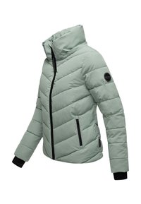 Light green padded winter jacket with high collar, black zipper, black cuff details, and a round brand patch on the sleeve.