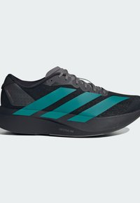 Black running shoe with teal accents, mesh upper, and textured detail. Features a sleek design and "LIGHTSTRIKE PRO" branding on the sole.