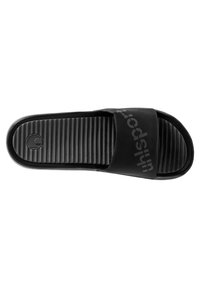 Black slide sandal featuring a textured footbed, flat sole, and a wide strap with contrasting logo print. Durable material with smooth finish.