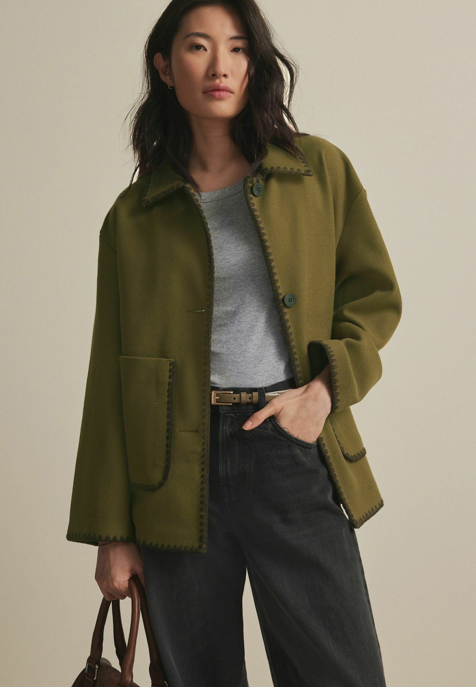 next green coat