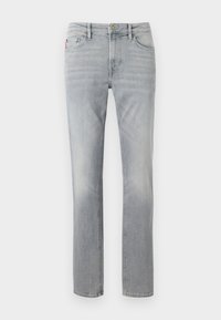 Šviesiai pilki džinsai su tiesiomis kojomis, pasižymintys subtiliu išblukimu, penkių kišenių dizainu ir metaliniu mygtuko užsegimu.