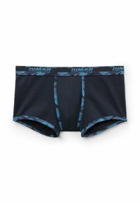 Boxershorts aus dunklem marineblauen Baumwollstoff, mit einem blauem Camouflage-Muster an der Taille und an den Seiten. Die Nähte sind verstärkt.