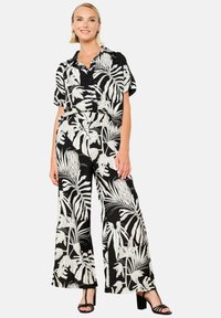 LolaLiza WIDE WITH TROPICAL PRINT - Pantaloni - black