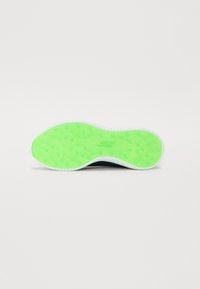 Green rubber sole with a textured pattern and white accents. The shoe features a shaped design for comfort and traction.