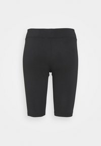 Pantaloni da ciclismo neri realizzati in tessuto elasticizzato. Design aderente con lunghezza fino a metà polpaccio e ampia cintura elastica. Dettagli delle cuciture visibili.