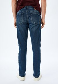 Koton BRAD - Vaqueros tapered - blue denim