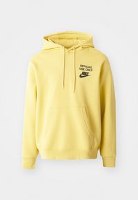 Žlutá mikina s kapucí, přední klokankovou kapsou, stahovacím šňůrkem a černým potiskem "OFFICIAL USE ONLY" s logem na hrudi.