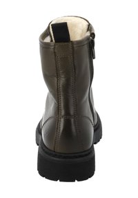 Brun läderankelboot med en strukturerad ovandel, dragkedjestängning och mjukt foder. Gummisula med mönstrad sula för bra grepp.