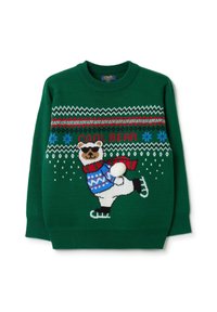 Grüner, gestrickter Pullover mit einem Bären auf Schlittschuhen, der einen blauen Pullover und einen roten Schal trägt, mit Schneeflocken- und Zickzackmustern.