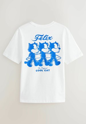 Hvid t-shirt med blåt grafik af Felix the Cat, der viser tre billeder af karakteren og teksten "Felix The Original Cool Cat".