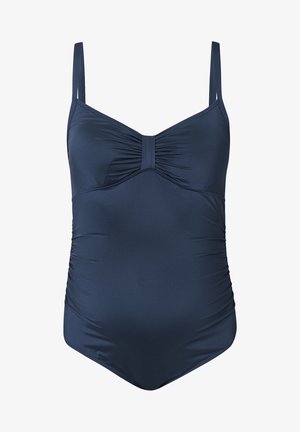 Marineblauwe monokini met verstelbare bandjes, geplooiddetail aan de voorkant en zijruching. Glad textuur van de stof. Geen patronen of hardware.