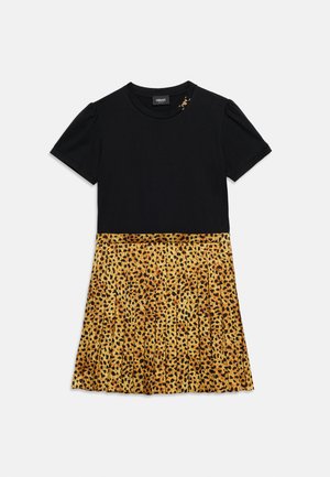 Black short-sleeve dress with a solid top and a pleated leopard-print skirt, featuring a small gold embellishment near the neckline.