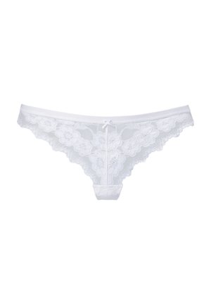 Weißer Spitzenstring mit floralem Muster, gewelltem Saum und kleiner zentraler Schleifenverzierung. Weicher Stoff mit transparenter Textur und niedriger Bundhöhe.