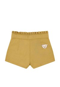 Pantalones cortos caqui con una cinturilla con volantes, que presentan un motivo de oso en la parte delantera, dos bolsillos y un acabado de tela texturizada.