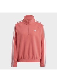 Fleece-pullover i korallrosa med en kvartdragkedja i kragen, vitt tre-stripesdesign på ärmarna och en liten vit logotyp på bröstet.