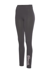 Zwarte leggings met een hoge tailleband, gemaakt van rekbaar materiaal. Heeft een lichtgekleurde "Bench." logo gedrukt op het onderbeen.