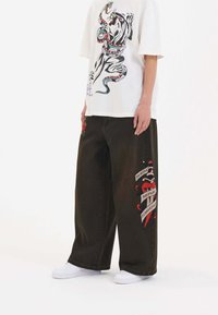 Ed Hardy DEATH BEFORE DISHONOR XTRA  - Flared jeans - black