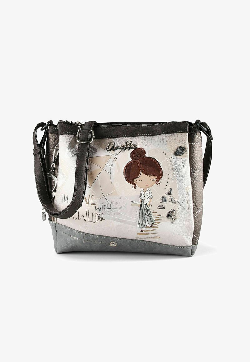 Torba na ramię z regulowanym paskiem, z nadrukiem kreskówkowej dziewczynki z kokiem, napisem oraz abstrakcyjnymi geometrycznymi wzorami w beżowych i szarych tonach.