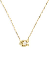 Collier en or avec un pendentif circulaire au centre en perle. La chaîne présente un design délicat et maillé, ce qui améliore son apparence élégante.