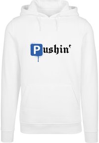 Hvid hættebluse, lavet af bomuldsstof, med en frontlomme. Grafisk design inkluderer det blå bogstav "P" og sort tekst "ushin'". Enkel pullover stil.