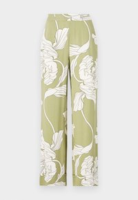 Pantalon large vert clair avec grand imprimé floral blanc, taille plate et ourlets revers.