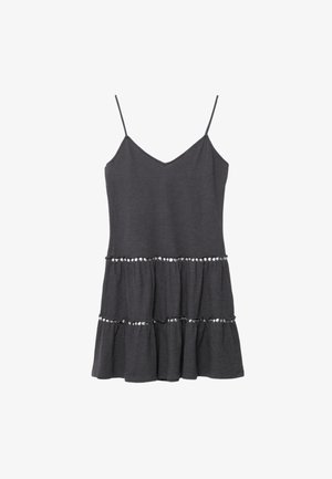 Black sleeveless dress with thin straps, tiered skirt, and rows of small reflective sequins on each tier.