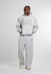 Karl Kani Tracksuit bottoms - grey