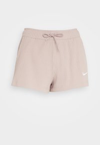 Ljusrosa ribbade stickade shorts med elastisk midja, snörning, sidfickor och vitt Nike-logotyp på vänster ben.