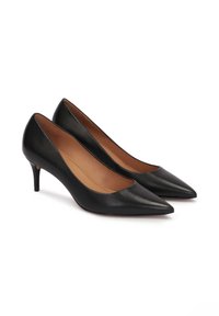 Black leather high-heeled pumps with a pointed toe design and a slender heel. Smooth texture with a tan interior lining.