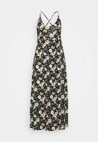 Kwiatowa sukienka maxi na czarnym tle; posiada dekolt w serek, krzyżujące się ramiączka oraz wzór białych i żółtych kwiatów z zielonymi liśćmi.