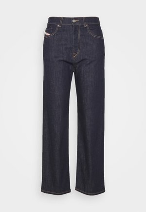 Mörkblå jeans med raka ben och en klassisk femficksdesign, med guldsömnad och blixtlås med knappstängning.