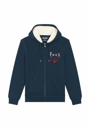 Navy zip-up hoodie with a fleece-lined interior, featuring white "love" text and a red safety pin graphic. Includes two front pockets.
