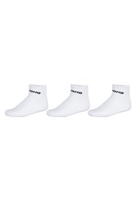 Tres pares de calcetines blancos hasta el tobillo con el logo negro "LOTTO" en los puños, exhibidos uno al lado del otro sobre un fondo blanco.