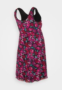 Vestido de maternidade floral com uma base preta, apresentando flores vibrantes em rosa, vermelho e azul-turquesa. Inclui alças largas e uma silhueta fluida.