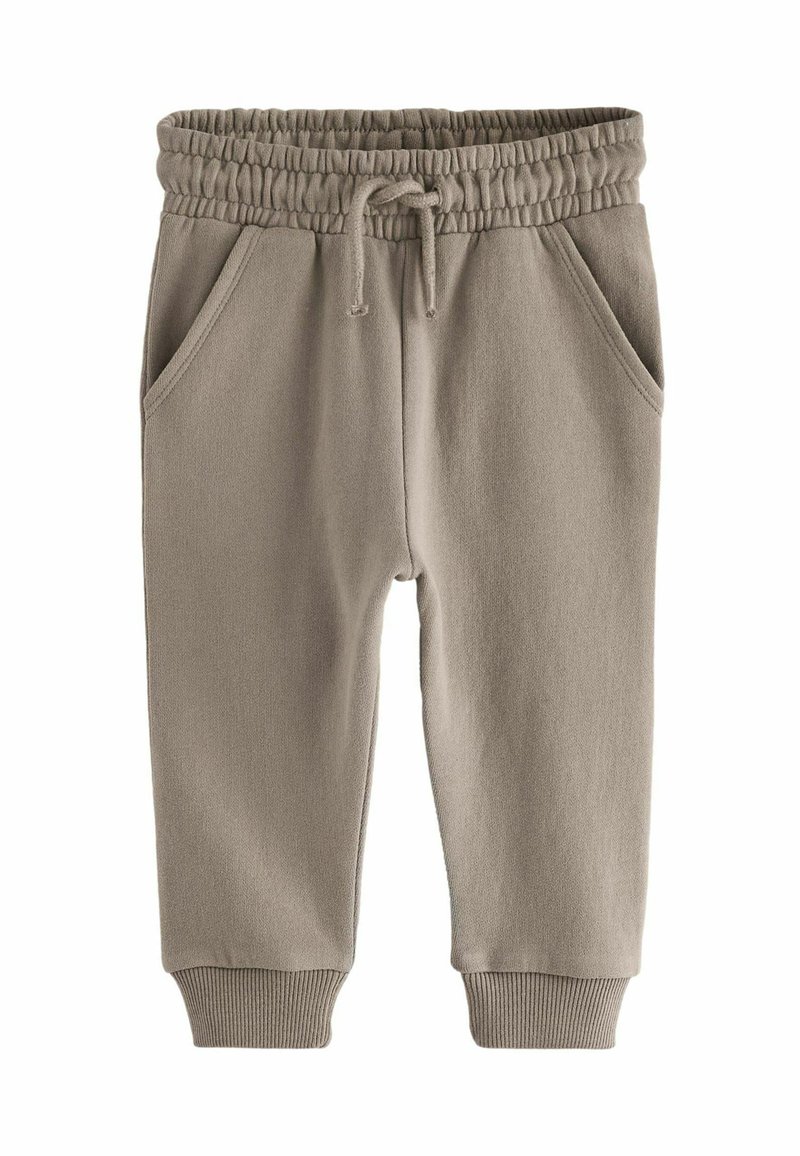 Helle beige Sweatpants aus weichem Material, mit einem elastischen Bund und Kordelzug, zwei seitlichen Taschen und gerippten Bündchen.