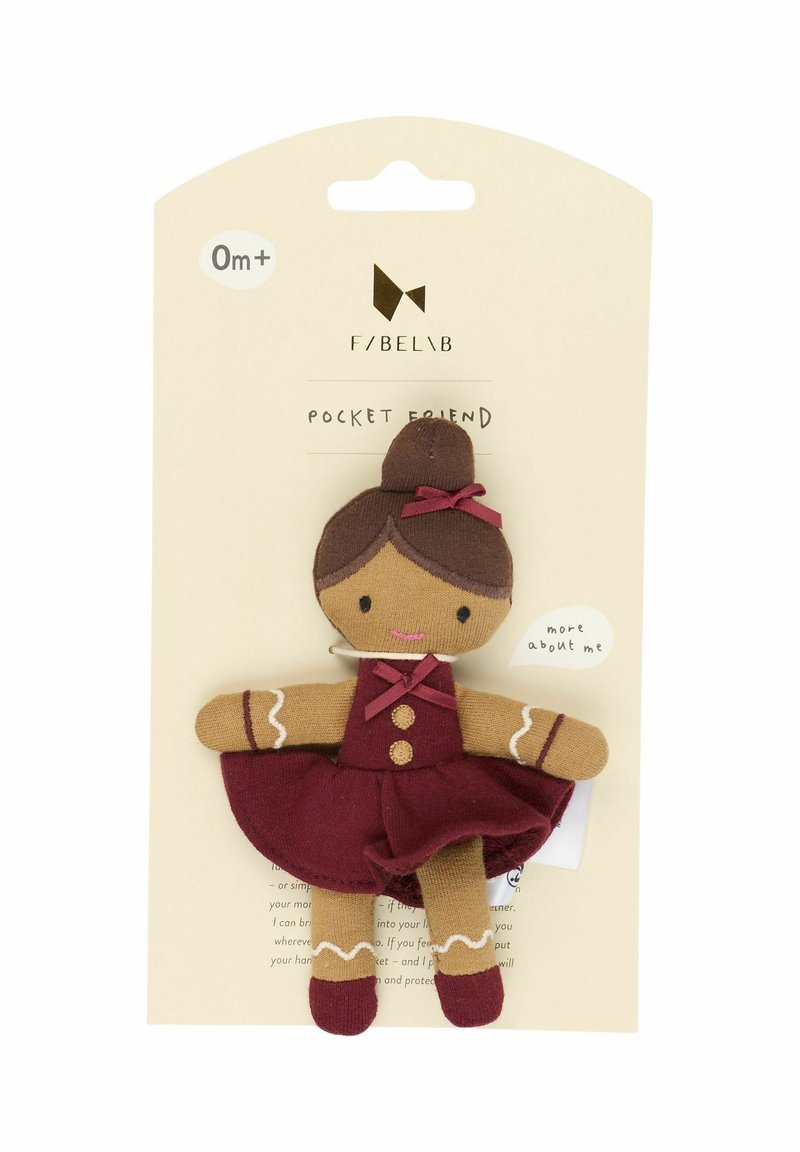 Soft fabric pocket toy with a brown-skinned doll wearing a maroon dress and bow, featuring stitched facial details and a tag.