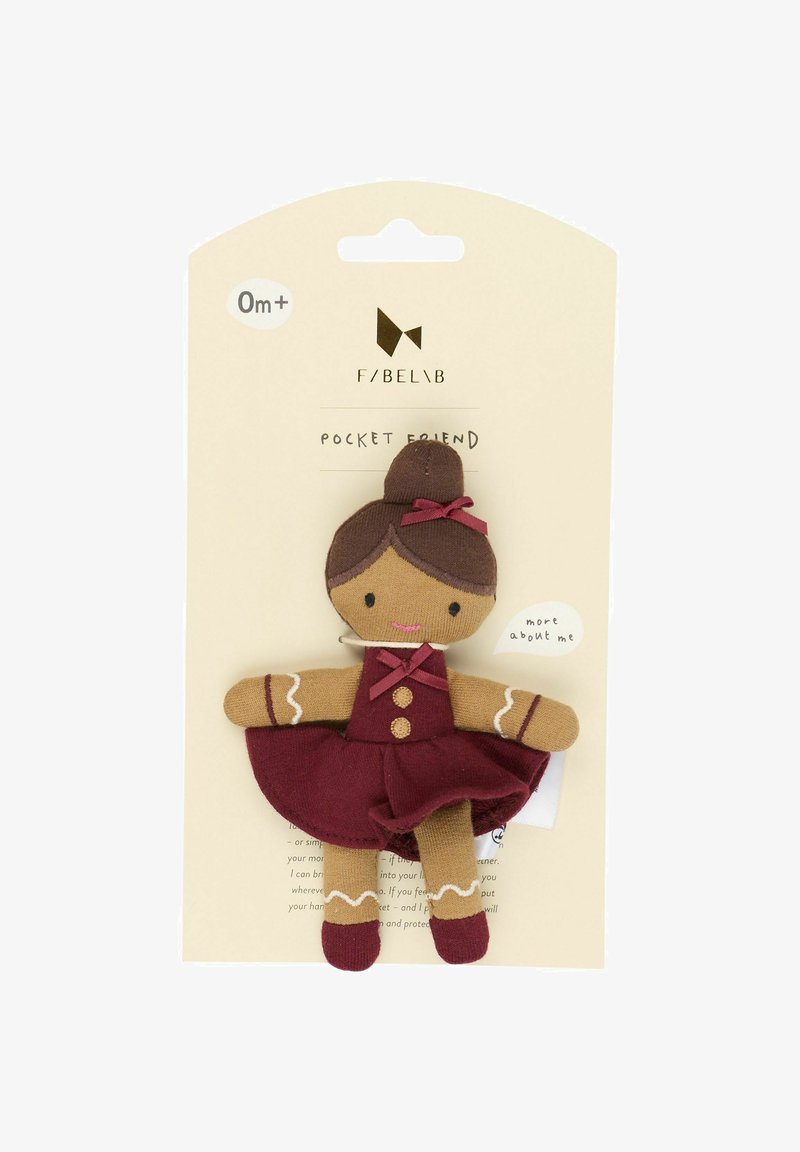Soft fabric pocket toy with a brown-skinned doll wearing a maroon dress and bow, featuring stitched facial details and a tag.
