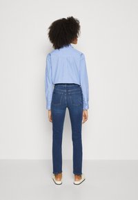 Marks & Spencer Jeans slim fit - med blue denim