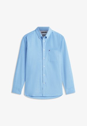 Jasnoniebieska koszula na długi rękaw z guzikami, z kieszenią na piersi i małym logo na kieszeni, z kołnierzykiem wiązanym na guziki.