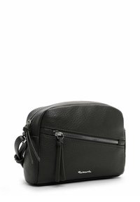 Dark green leather crossbody bag with a textured surface, featuring a silver zipper, side tassel, and subtle brand logo detail.
