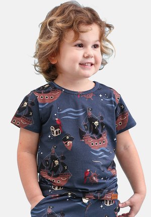 Navy blue short-sleeve t-shirt featuring pirate ships, treasure chests, and parrots in vibrant colors and detailed illustrations.