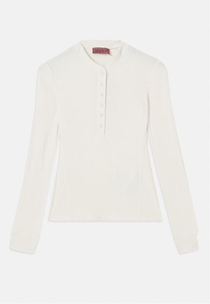Pitkähihaista valkoista ribbipaitaa, jossa on henley-tyylinen kaulus ja kuuden napin lista, mukautuvat hihansuut ja hieman kapeampi muoto.