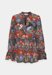 Květinová blůza s dlouhými rukávy, vyrobená z lehkého materiálu, s živým oranžovým pozadím, barevnými květinovými vzory a zavazováním u krku.