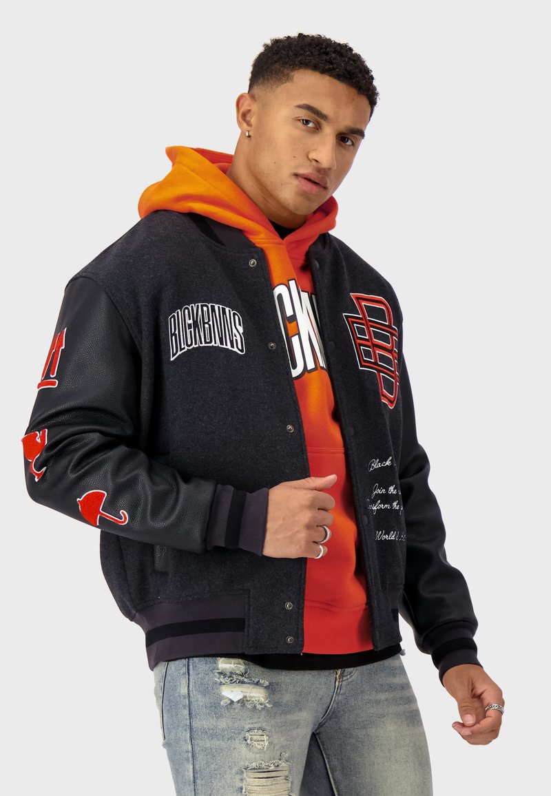 supreme team varsity jacket black